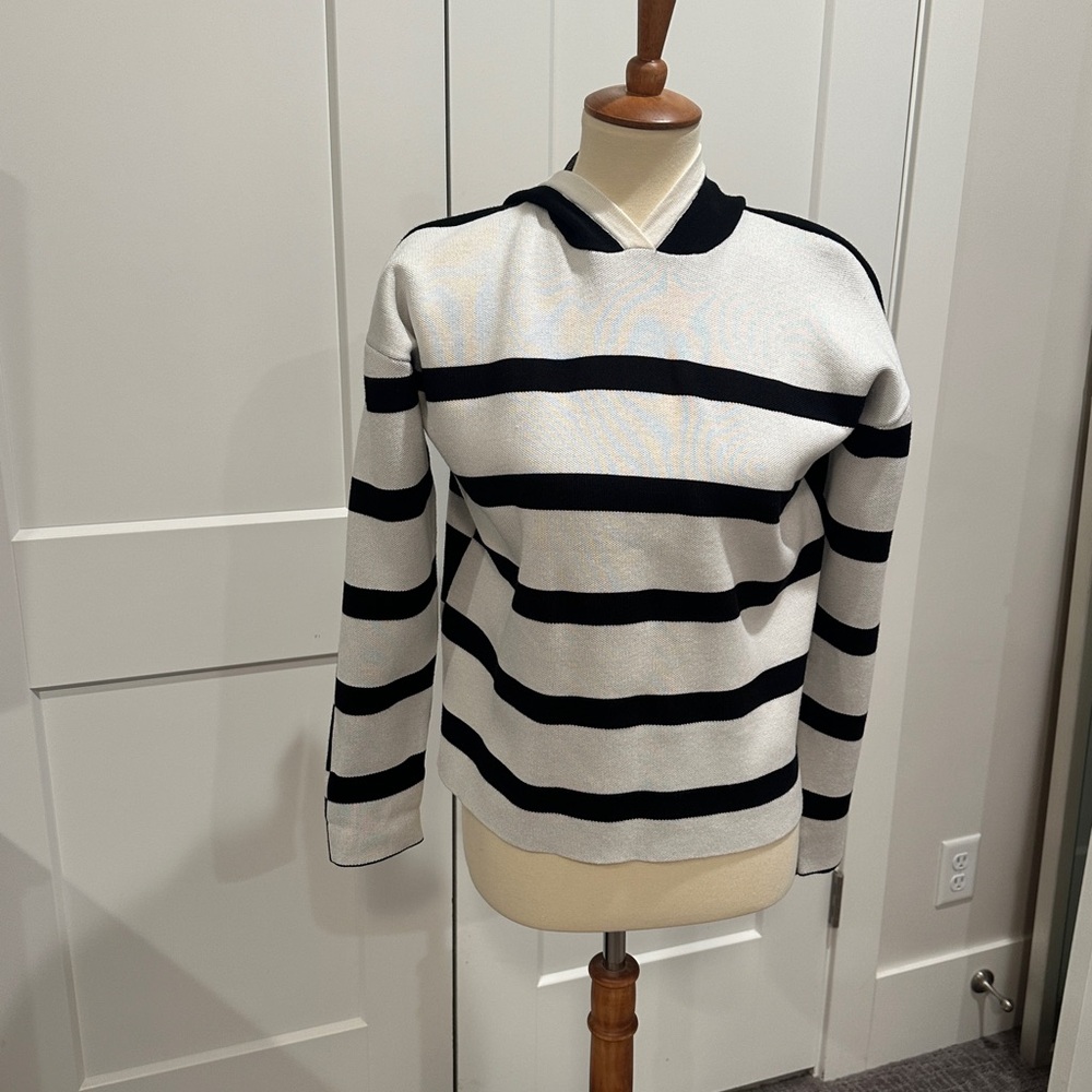 Cyrus Black and White Striped Pullover never worn without tags.